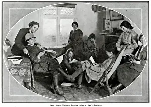 Labourers Prints: Female land army workers resting after a full day 1918