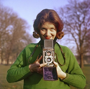 Adjusts Gallery: Female Photographer