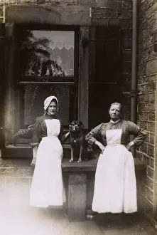 Drainpipe Prints: Two female servants and dog in yard