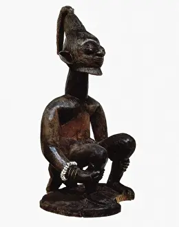 Oceanic Prints: Figure on a log. Yoruba art