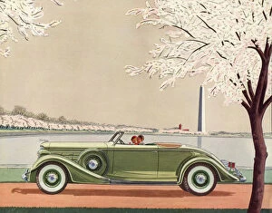 Elegance Collection: A fine green open-top convertible 1920s sports car passes the Washington Monument