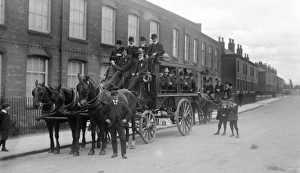 Conveyance Gallery: Finishers on conveyance in front of hat factory