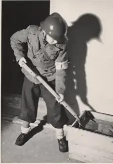 Finland Prints: Finnish boy scout as ARP warden, Helsinki, WW2