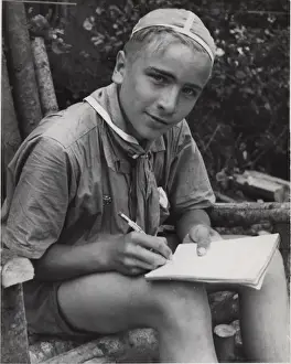 Skullcap Prints: Finnish boy scout writing in a notebook