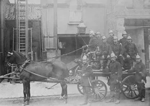 Fire crew and horse drawn pump