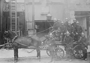 Fire crew and horse drawn pump