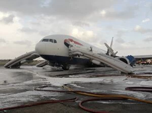 Airports Gallery: Fire crews attend the aftermath of a plane crash