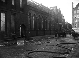 Fireman with hosepipe