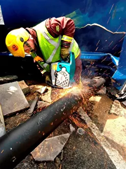 Lorry Prints: Firefighter cutting through pipe after road traffic accident