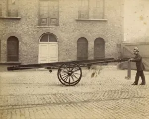 A firefighter with a Merryweather wheeled ladder escape