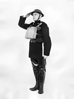 Firefighter in protective fire gear, WW2