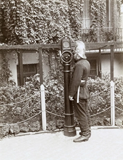 Alarms Gallery: Firefighter using telephone point in street