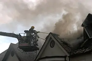 Platforms Prints: Firefighter working from hydraulic platform