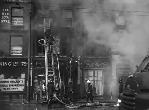 Extinguish Prints: Firefighters in action in Commercial Road, East London