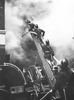 Fireman with hosepipe