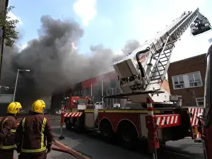 Firefighters in action at a fire, VDC House, Wembley