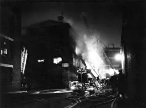 Spreading Gallery: Firefighters in action with hosepipes, Shad Thames, SE1