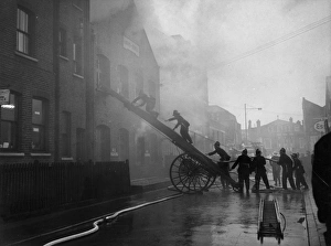 Fireman with hosepipe
