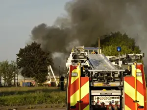 Firefighters attend a fire at 1 Mollison Avenue