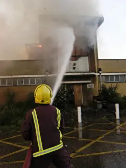 Firefighters attend a fire at 1 Mollison Avenue