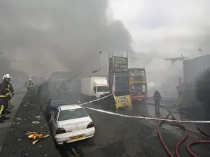 Firefighters attend fire at bus garage