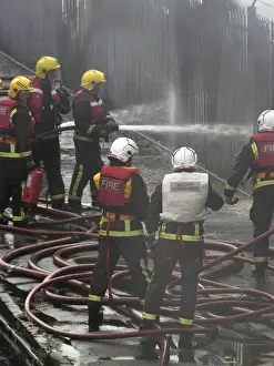 Firefighters attend fire at bus garage