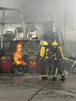 Firefighters attend fire at bus garage