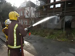 Firefighters attend a house fire at Rydal Road