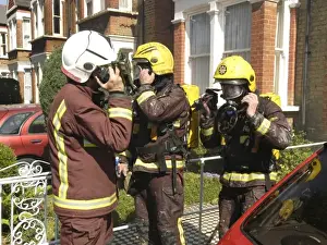 Stripe Prints: Firefighters attending a fire at 81 Woolstone Road