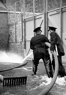 Extended Prints: Firefighters controlling jet of water, Brigade HQ, Lambeth