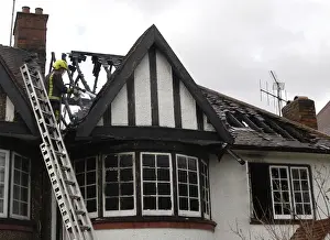 Firefighters dealing with a house fire