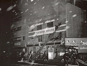 Images Dated 19th October 2011: Firefighters at a fire, 197 Commercial Road, East London
