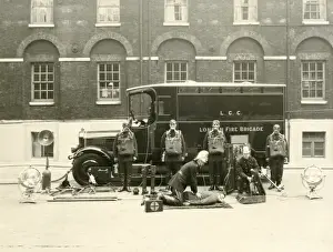 Emergency Prints: Firefighters with one of the first emergency tenders
