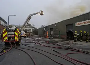 Firefighters in a hydraulic lift