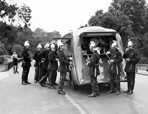 Watching Prints: Firefighters outside a canteen van, Battersea, London