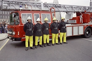 Images Dated 31st May 1977: Firefighters on parade in front of their appliance