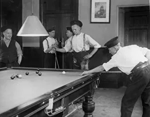 Resting Gallery: Firefighters playing billiards in fire station