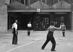 Racket Prints: Firefighters playing tennis during a break, London