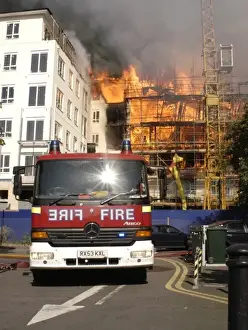 Firefighters putting out a fire at 1 Heton Gardens