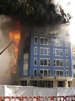 Firefighters putting out a fire at 1 Heton Gardens
