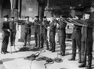 Instruction Prints: Firefighters receiving knots instruction