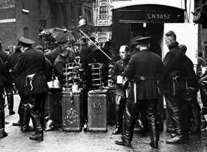 Firefighters on refreshment break, Wapping, East London