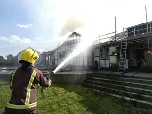 Firefighters respond to a building fire, West London