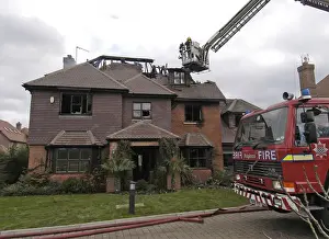 Firefighters respond to a house fire in Enfield