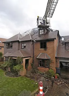 Platforms Prints: Firefighters respond to a house fire in Enfield