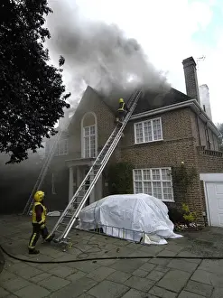 2005 Prints: Firefighters respond to a house fire, North London