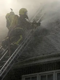 Firefighters respond to a house fire, North London