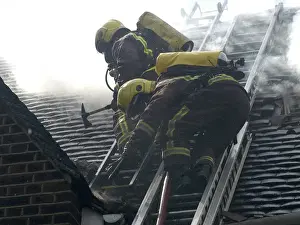 Firefighters respond to a house fire, North London