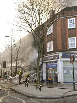 Firefighters at scene of commercial premises fire