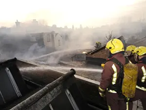 Firefighters at scene of commercial premises fire